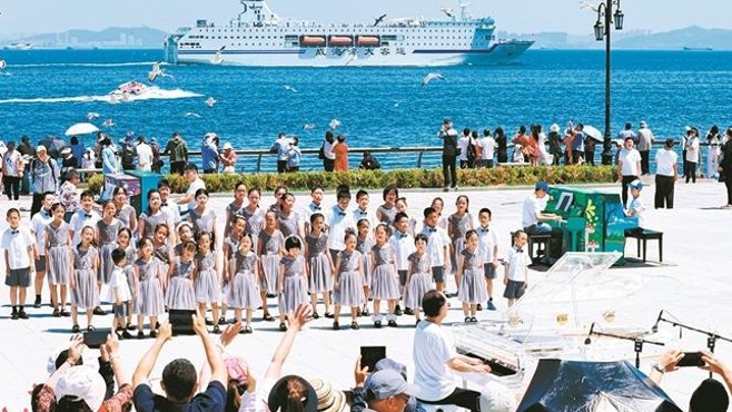 琴音踏浪 全城共此时