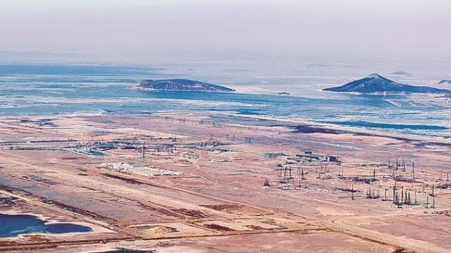 迎寒风战低温 大连新机场抢工筑基夯声不息